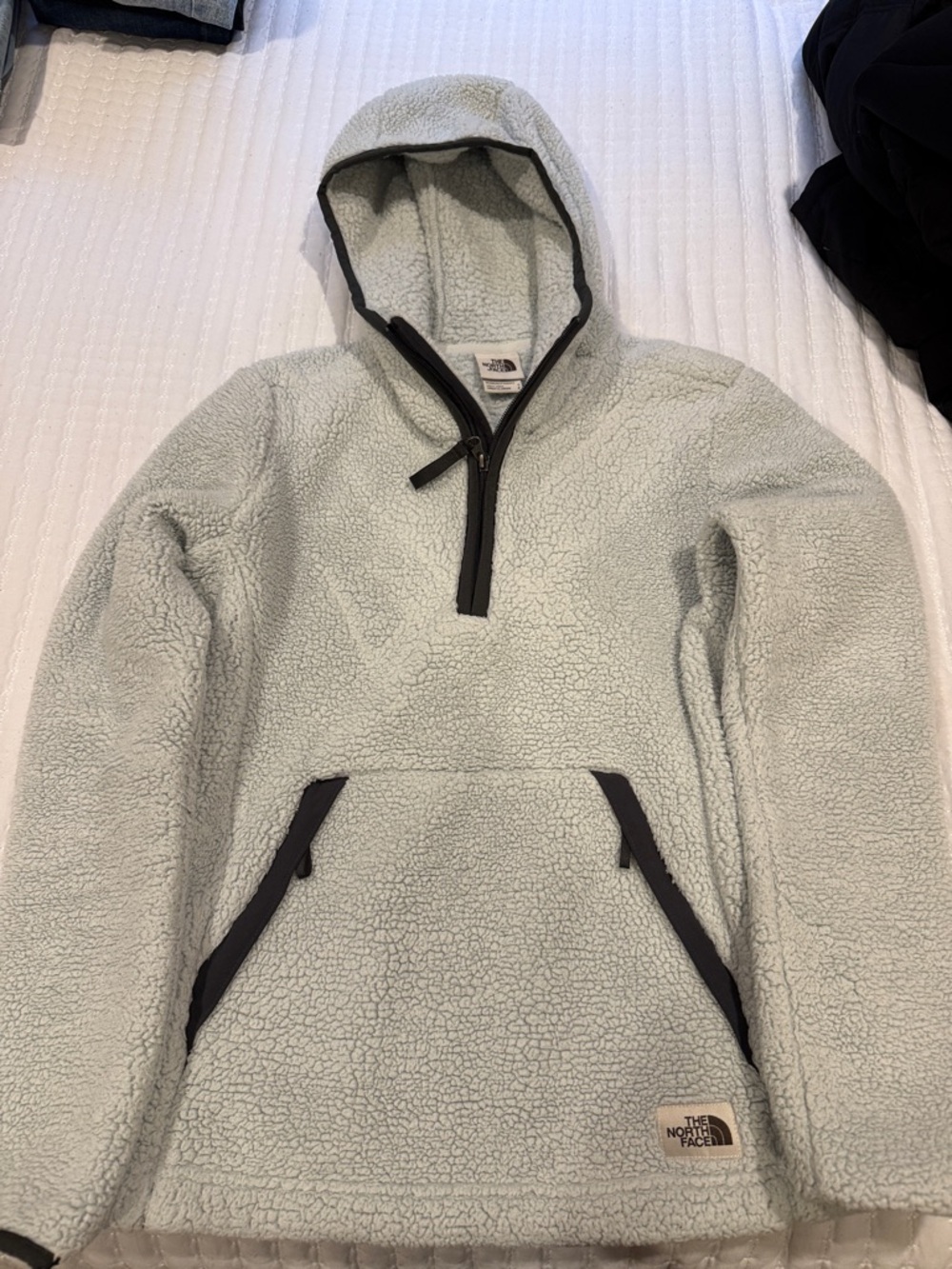 The North Face women’s Light Gray Sherpa Fleece Half-Zip Hoodie